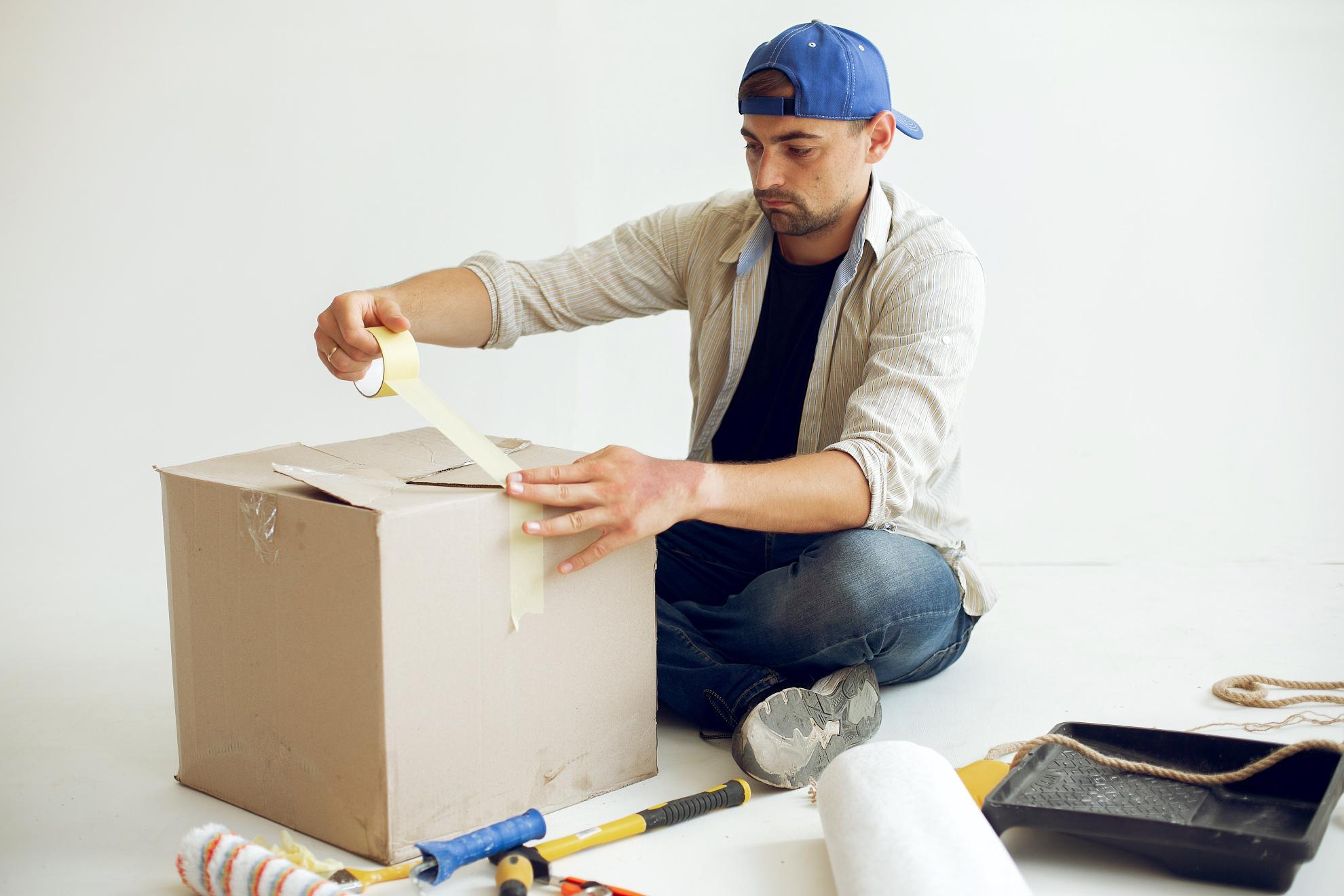 handsome man repairs room